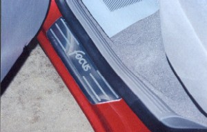 Rear scuff plate on the rear driver's side door.
